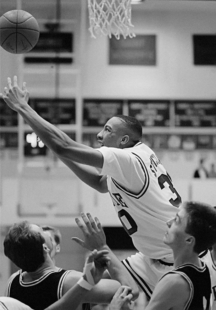 Sports Photography, Rebounding at a Temple University Basketball game, Philadelphia, Pennsylvania