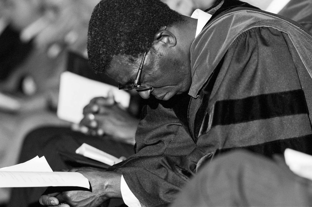People Photography, Moment of prayer at Westminter Theological Seminary's commencement, Keswick Theater, Glenside, Pennsylvania